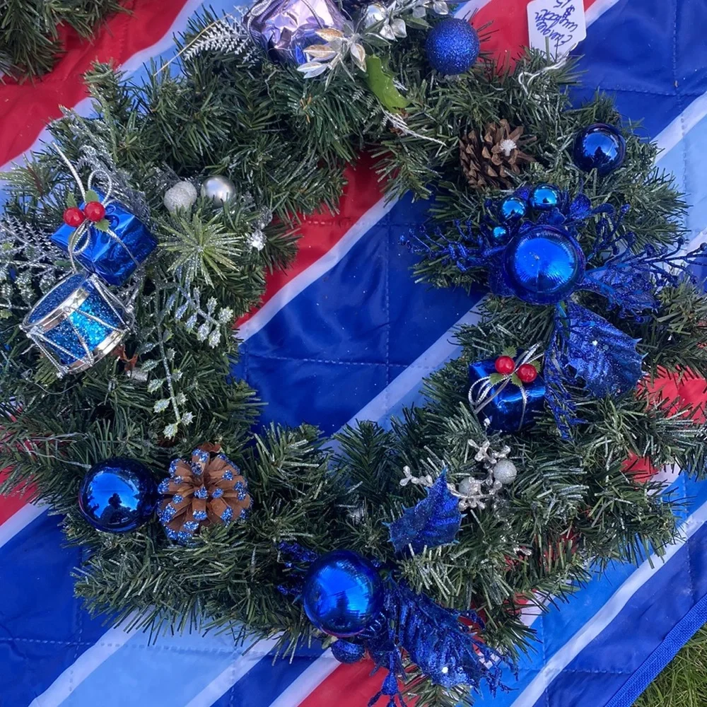 Evergreen Wreath Trimmed with silver and blue and pine ones